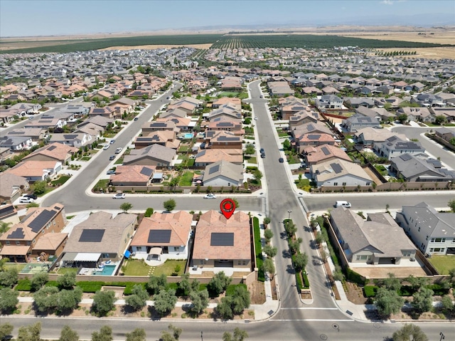 602 Pinnacle Dr W, Madera, CA 93636 - aerial view of property and surrounding area featuring nearby suburban area