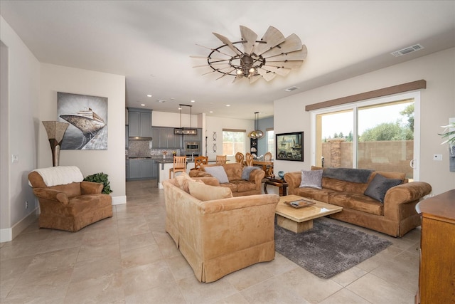 602 Pinnacle Dr W, Madera, CA 93636 - living room featuring light tile patterned flooring and recessed lighting