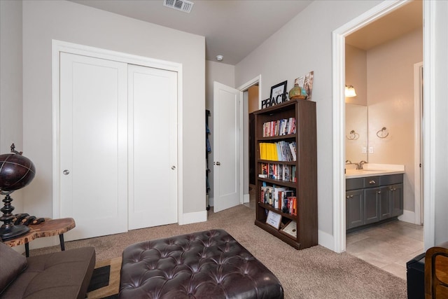 602 Pinnacle Dr W, Madera, CA 93636 - bedroom with a closet, light colored carpet, and connected bathroom