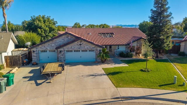 318 San Madele Ave, Coalinga, CA 93210 - mediterranean / spanish-style house with a tiled roof, concrete driveway, a garage, and stone siding