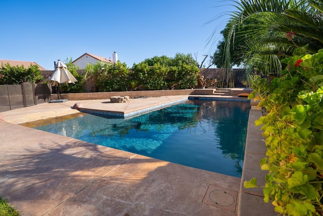 318 San Madele Ave, Coalinga, CA 93210 - view of pool featuring a fenced backyard and a patio area