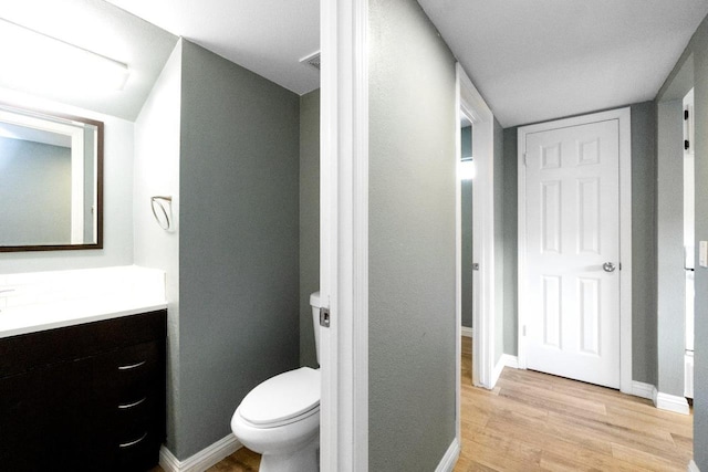 4727 E Alamos Unit 118, Fresno, CA 93726 - bathroom with vanity and wood finished floors