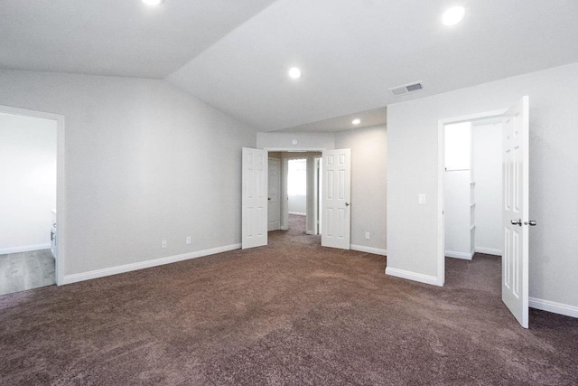 4727 E Alamos Unit 118, Fresno, CA 93726 - unfurnished bedroom with carpet flooring, recessed lighting, and vaulted ceiling