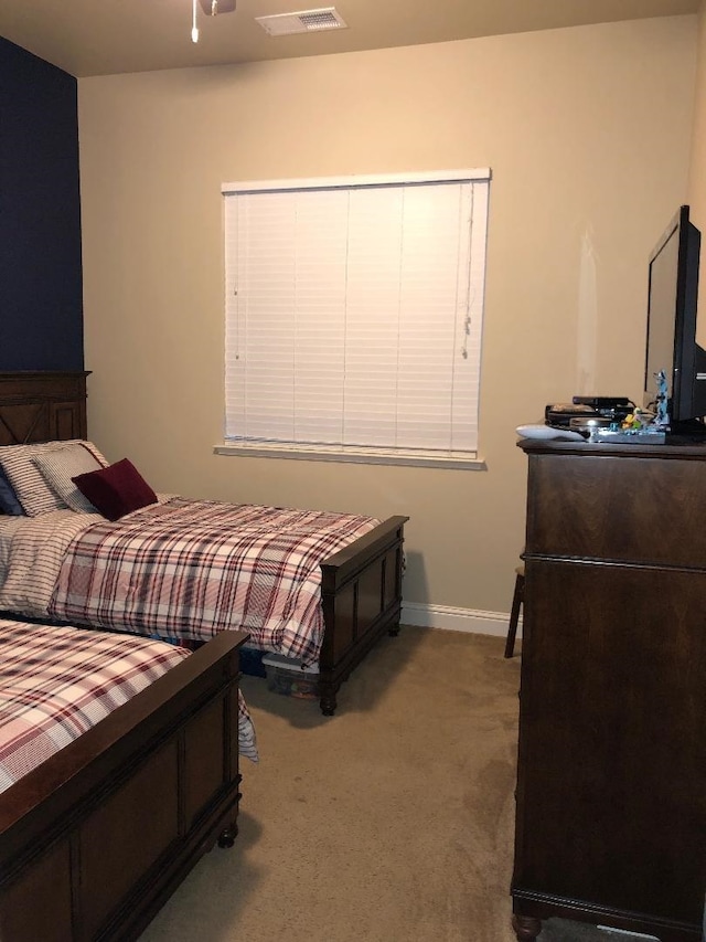 7951 N Fine Ave, Fresno, CA 93720 - carpeted bedroom featuring baseboards