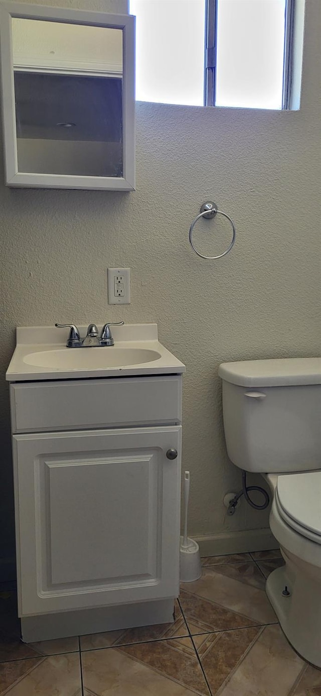 917 E Fountain Way, Fresno, CA 93704 - half bathroom featuring toilet and vanity