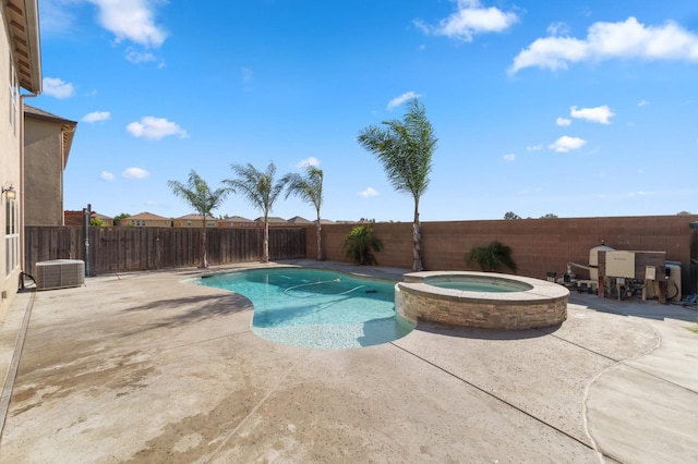 376 S Knox St, Madera, CA 93638 - view of swimming pool featuring a patio area, a fenced backyard, and a pool with connected hot tub