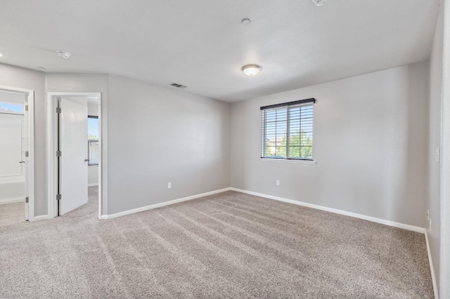 376 S Knox St, Madera, CA 93638 - carpeted empty room featuring baseboards