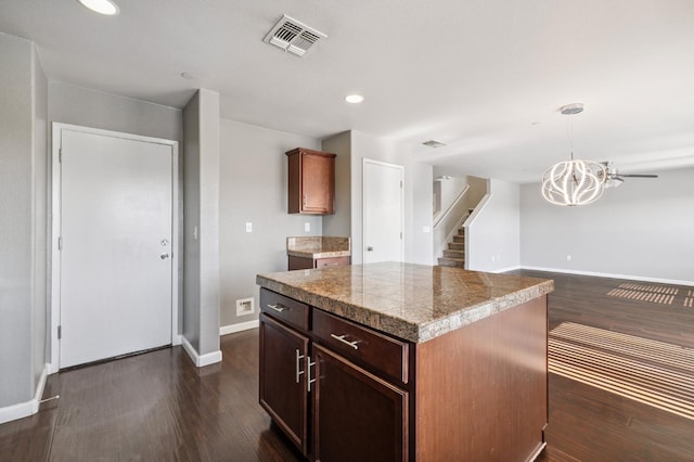 376 S Knox St, Madera, CA 93638 - kitchen featuring tile countertops, dark wood-type flooring, recessed lighting, a chandelier, and decorative light fixtures
