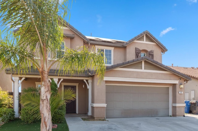 376 S Knox St, Madera, CA 93638 - view of front of property with driveway, stucco siding, a tile roof, and a garage