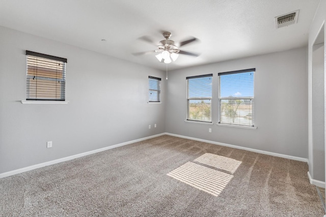 376 S Knox St, Madera, CA 93638 - unfurnished room featuring carpet floors and a ceiling fan