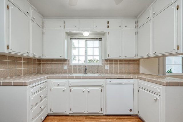 1445 W Ellery Way, Fresno, CA 93711 - kitchen with dishwasher, white cabinets, and backsplash