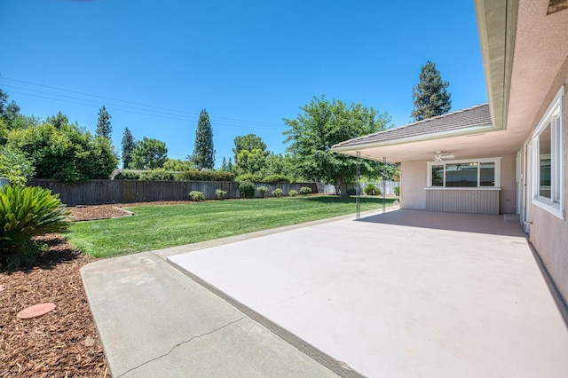 1445 W Ellery Way, Fresno, CA 93711 - fenced backyard featuring a patio area and a ceiling fan