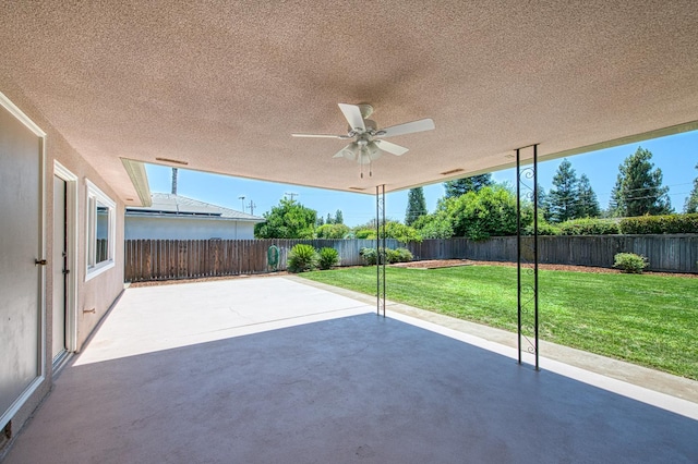 1445 W Ellery Way, Fresno, CA 93711 - fenced backyard featuring a patio and a ceiling fan