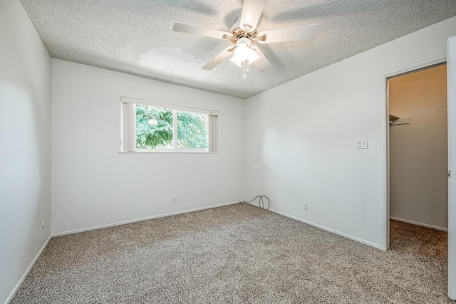 1445 W Ellery Way, Fresno, CA 93711 - carpeted empty room featuring a textured ceiling and ceiling fan