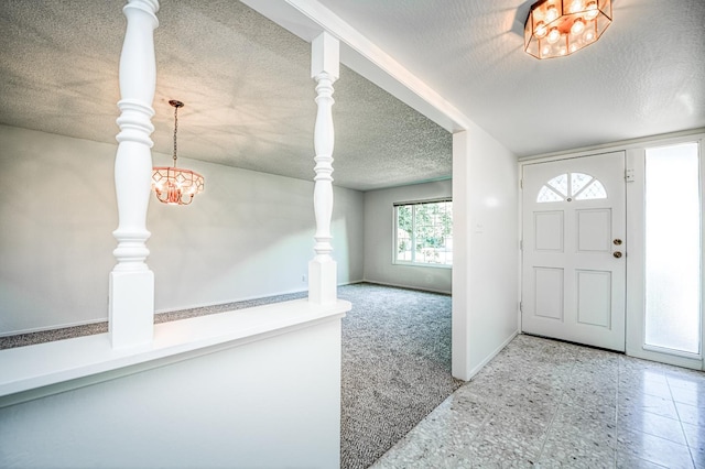 1445 W Ellery Way, Fresno, CA 93711 - carpeted foyer entrance with a textured ceiling and a chandelier