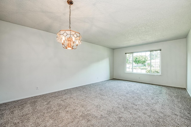 1445 W Ellery Way, Fresno, CA 93711 - carpeted spare room featuring a chandelier and a textured ceiling