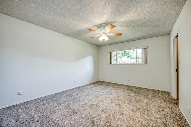 1445 W Ellery Way, Fresno, CA 93711 - spare room featuring carpet floors, a ceiling fan, and a textured ceiling