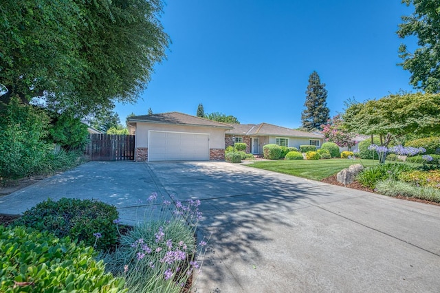 1445 W Ellery Way, Fresno, CA 93711 - ranch-style home with concrete driveway, a garage, and stucco siding