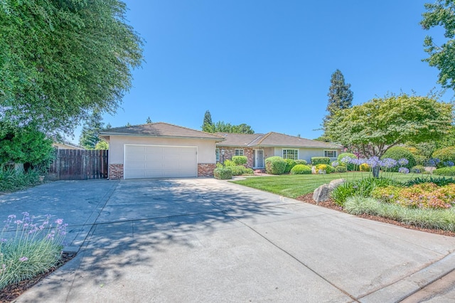 1445 W Ellery Way, Fresno, CA 93711 - single story home with concrete driveway, stucco siding, and a garage