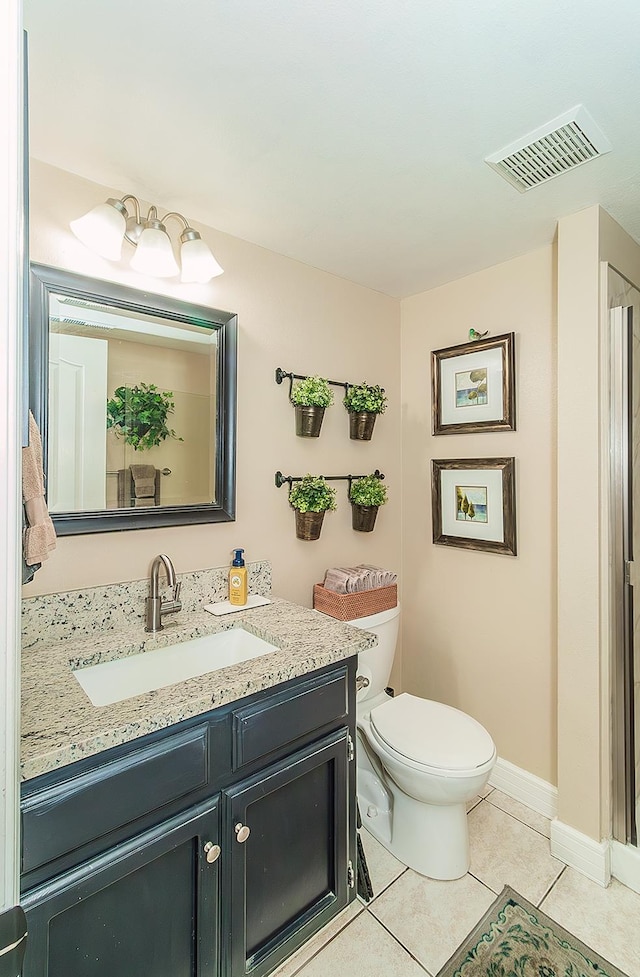 3012 Fairmont Ct, Madera, CA 93637 - bathroom with vanity and tile patterned flooring
