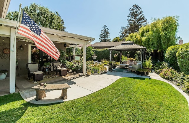 3012 Fairmont Ct, Madera, CA 93637 - view of grassy yard with outdoor lounge area, a gazebo, and a patio