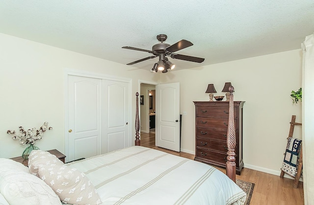 3012 Fairmont Ct, Madera, CA 93637 - bedroom with light wood-type flooring, a closet, ceiling fan, and a textured ceiling