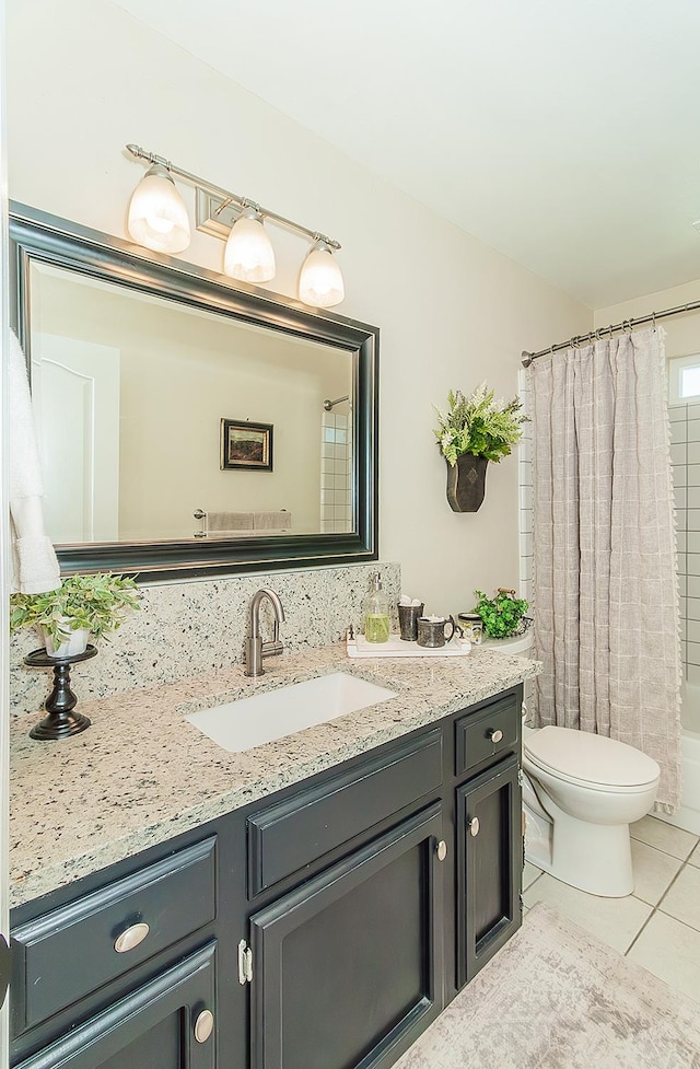 3012 Fairmont Ct, Madera, CA 93637 - full bathroom with vanity, tile patterned flooring, and shower / bath combo