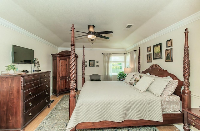 3012 Fairmont Ct, Madera, CA 93637 - bedroom with light wood-style floors, ornamental molding, and ceiling fan