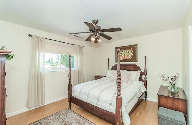 3012 Fairmont Ct, Madera, CA 93637 - bedroom with light wood-style flooring and ceiling fan