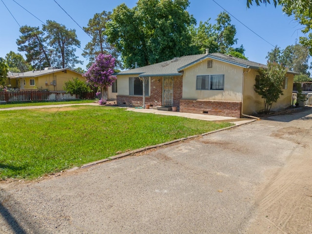3684 W Belmont Ave, Fresno, CA 93722 - ranch-style house with brick siding and crawl space