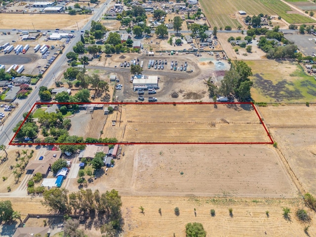 3684 W Belmont Ave, Fresno, CA 93722 - aerial view of sparsely populated area featuring property parcel outlined