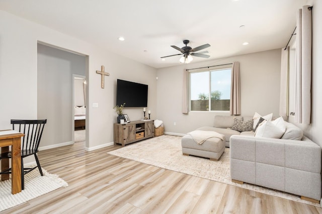 1275 Traverse Dr S, Madera, CA 93636 - living area featuring light wood-style floors, ceiling fan, and recessed lighting