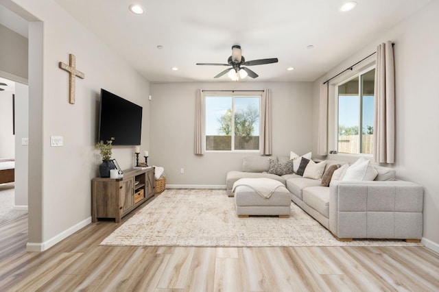1275 Traverse Dr S, Madera, CA 93636 - living room featuring plenty of natural light, light wood finished floors, ceiling fan, and recessed lighting