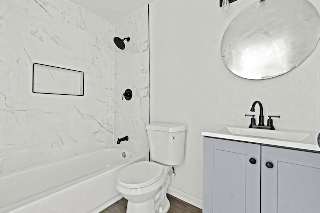 124 E 4th St, Hanford, CA 93230 - bathroom with vanity, washtub / shower combination, and wood finished floors