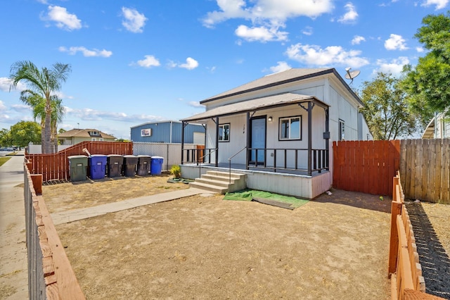 124 E 4th St, Hanford, CA 93230 - manufactured / mobile home featuring covered porch