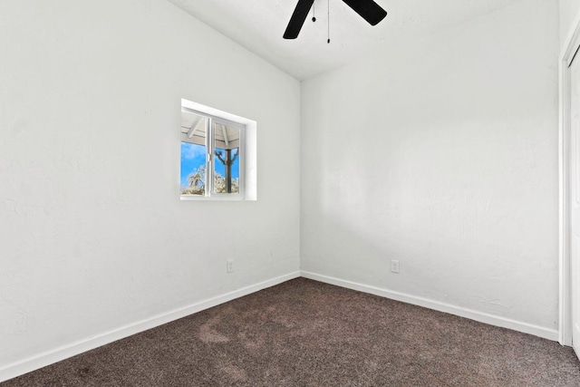 124 E 4th St, Hanford, CA 93230 - empty room featuring dark colored carpet and a ceiling fan