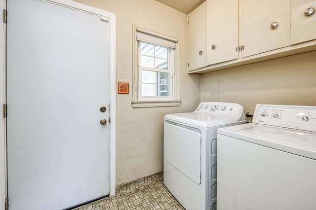 4740 E Washington Ave, Fresno, CA 93702 - laundry area featuring washer and dryer and cabinet space
