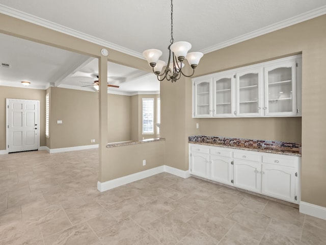 8147 N Cedar Unit 116, Fresno, CA 93720 - unfurnished dining area featuring a chandelier, ornamental molding, and a ceiling fan