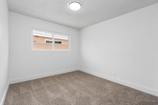 145 W Atchison Ave, Fresno, CA 93706 - spare room featuring carpet flooring and a textured ceiling