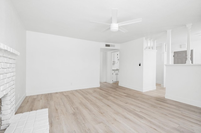 145 W Atchison Ave, Fresno, CA 93706 - unfurnished living room featuring a ceiling fan and light wood finished floors
