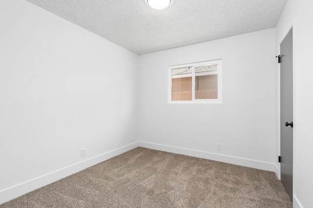 145 W Atchison Ave, Fresno, CA 93706 - unfurnished room with carpet and a textured ceiling