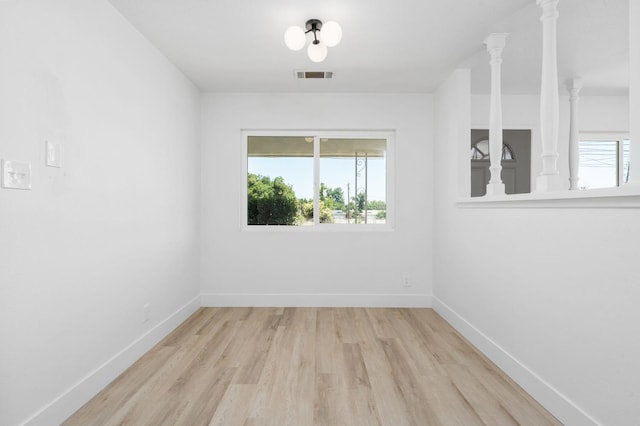 145 W Atchison Ave, Fresno, CA 93706 - empty room featuring plenty of natural light and wood finished floors