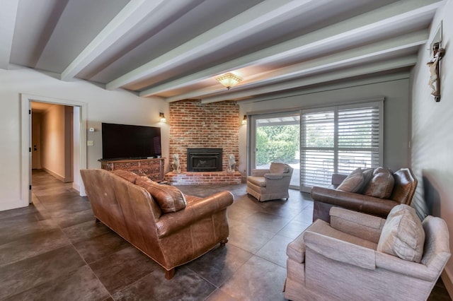 5679 N Van Ness Blvd, Fresno, CA 93711 - living room featuring beamed ceiling, a fireplace, and dark tile patterned flooring