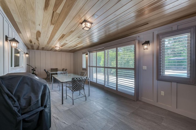 5679 N Van Ness Blvd, Fresno, CA 93711 - tiled dining space featuring wood ceiling and a decorative wall