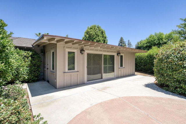 5679 N Van Ness Blvd, Fresno, CA 93711 - back of property featuring a patio area and board and batten siding