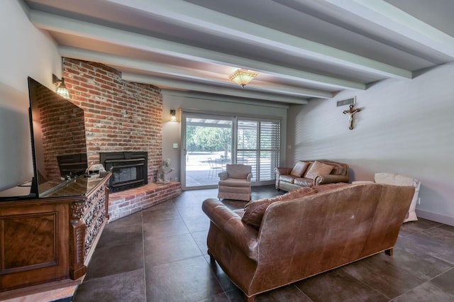 5679 N Van Ness Blvd, Fresno, CA 93711 - living area with a fireplace, beamed ceiling, and tile patterned floors