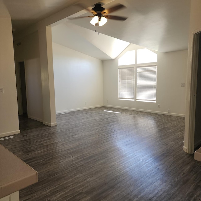 12015 E Shaw Ave, Clovis, CA 93619 - spare room with a ceiling fan, vaulted ceiling, and dark wood finished floors