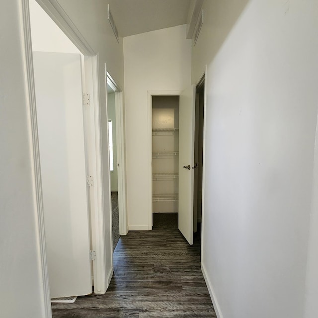 12015 E Shaw Ave, Clovis, CA 93619 - hallway featuring dark wood-type flooring and baseboards