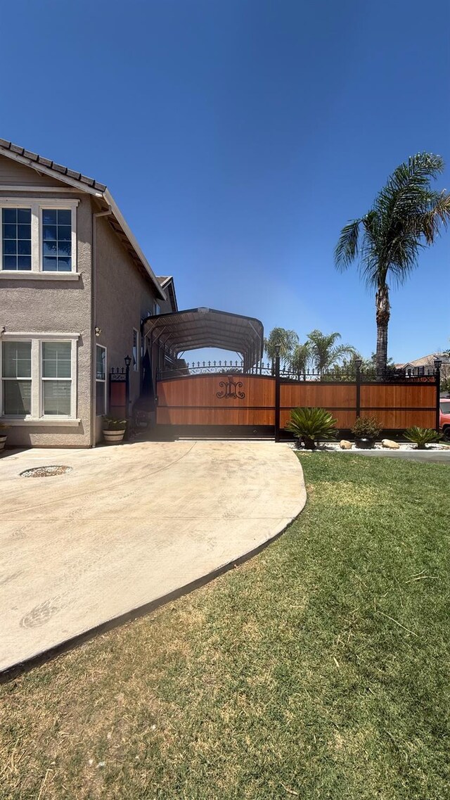5335 E Hoxie Ave, Fresno, CA 93725 - view of yard featuring a carport