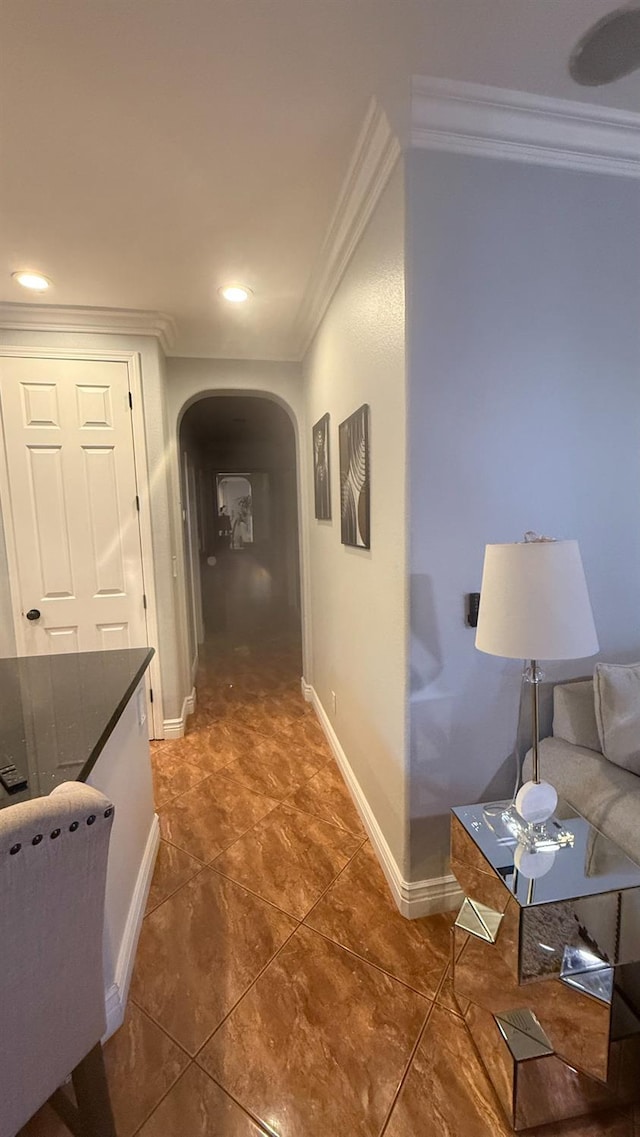 5335 E Hoxie Ave, Fresno, CA 93725 - corridor with ornamental molding, arched walkways, tile patterned floors, and recessed lighting